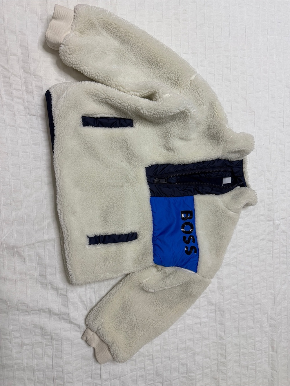 BOSS Kids Cream Sherpa Jacket with Blue Chest Panel and Navy Trim